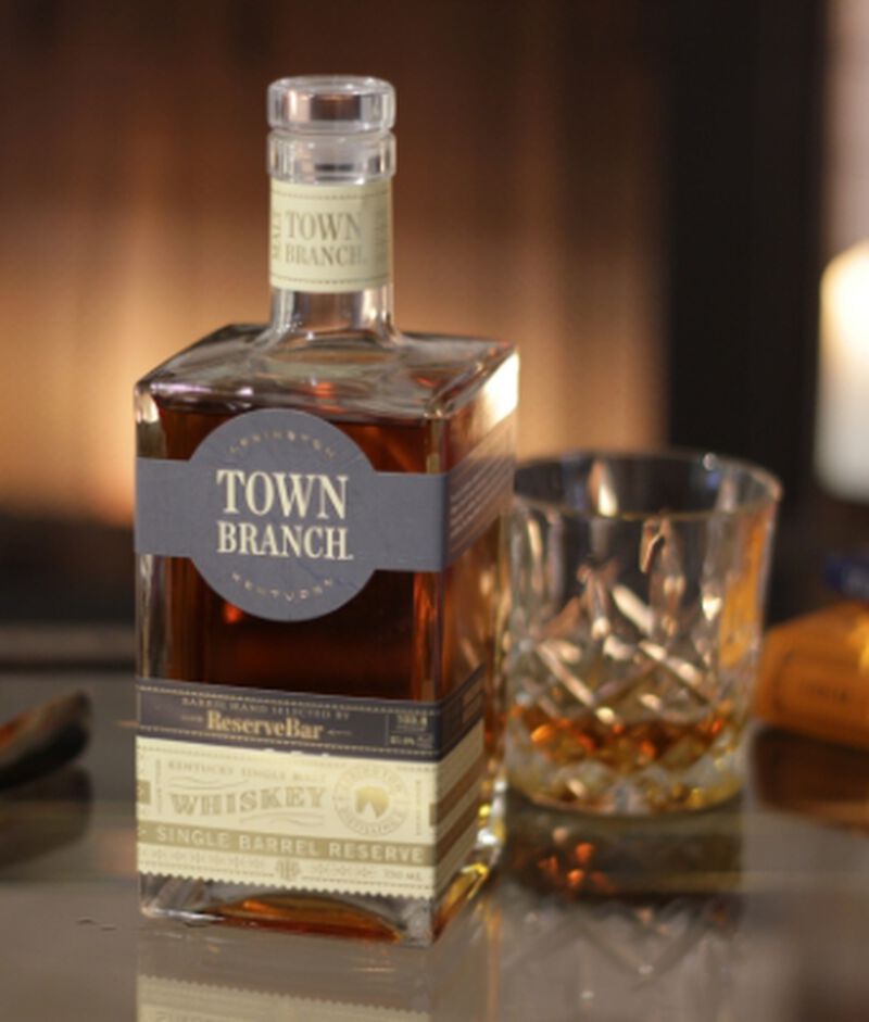 Bottle of Town Branch Single Barrel Reserve Single Malt Whiskey S1B38 with a cocktail