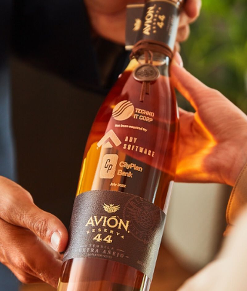 A bottle of Avion tequila with custom engraving for Corporate  gifting
