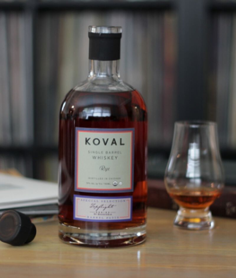 Bottle of KOVAL Cask Strength Rye S1B36 with a tasting glass