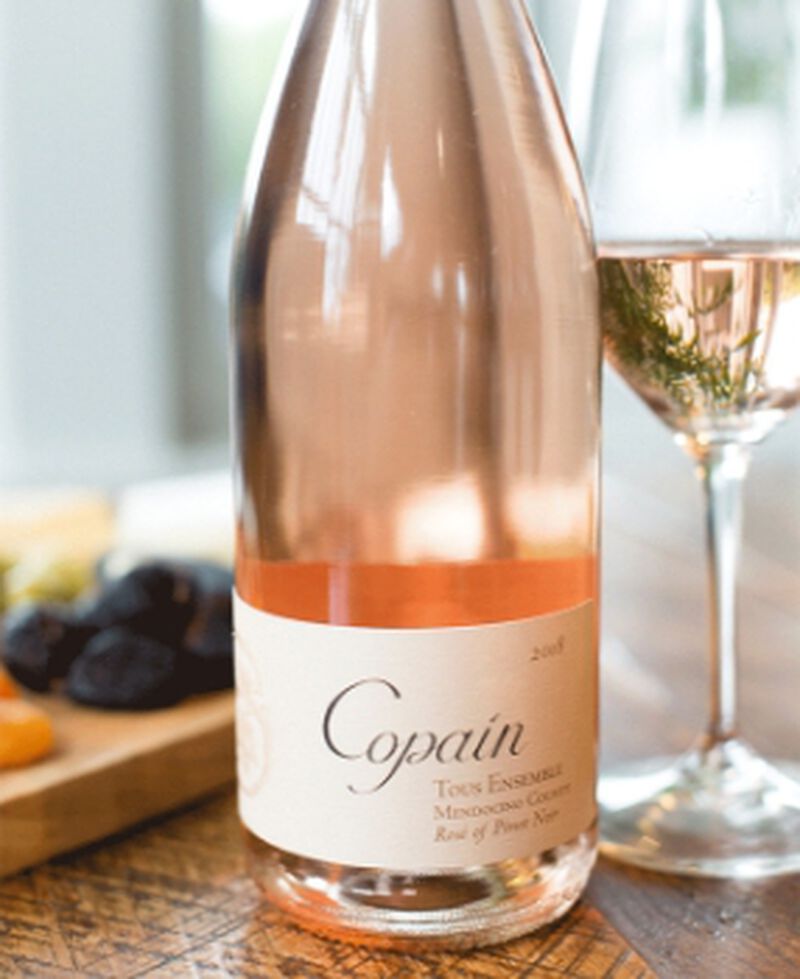 Bottle of Copain Wines 'Tous Ensemble' Mendocino County Rosé with a glass