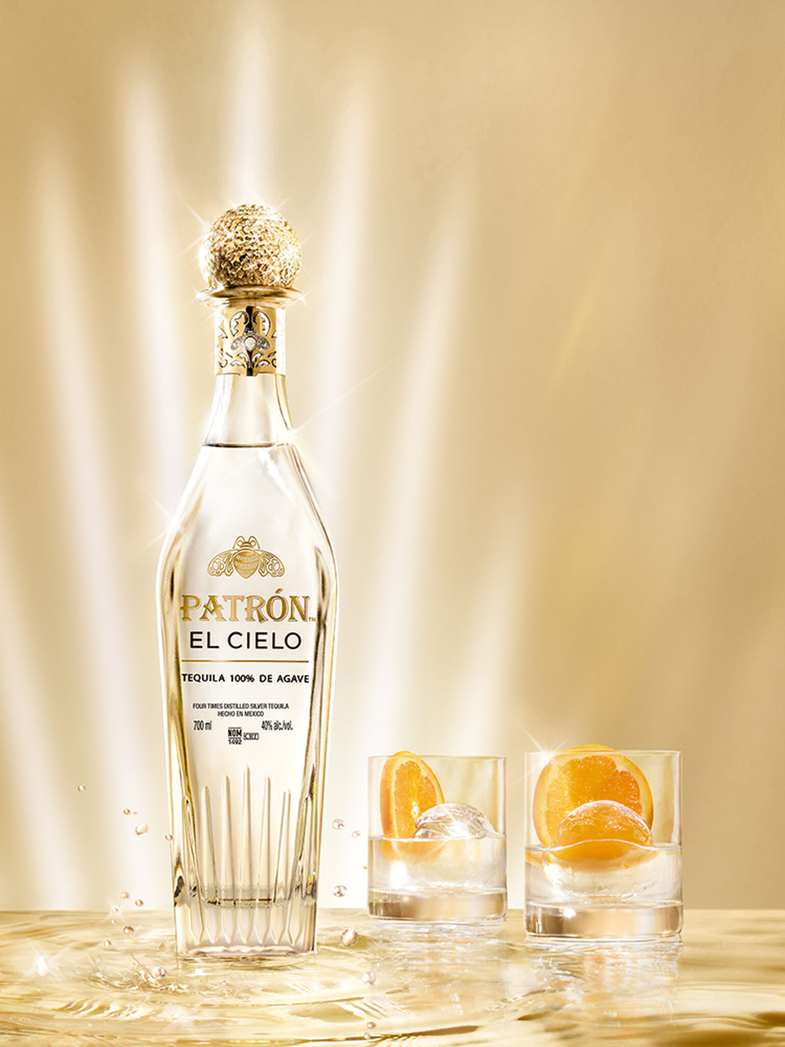 Bottle of PATRÓN EL CIELO with two cocktails