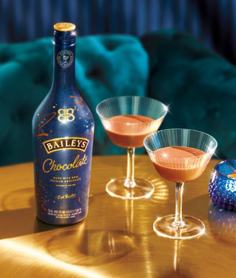 Bottle of Baileys Chocolate Irish Cream Liqueur with cocktails