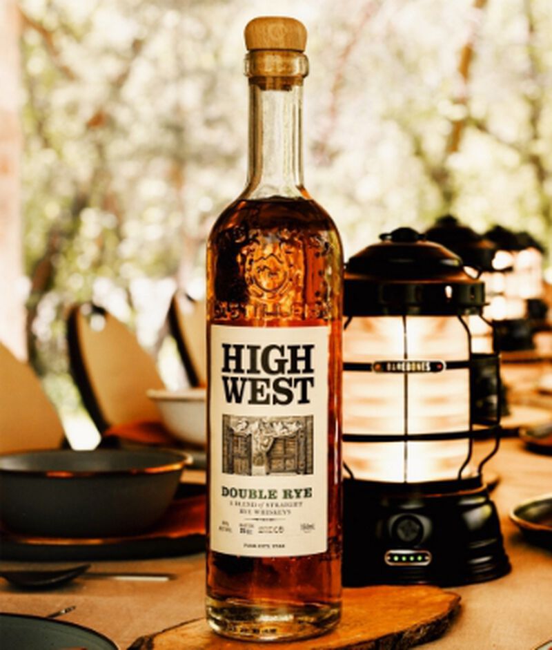 Bottle of High West Whiskey with a lantern