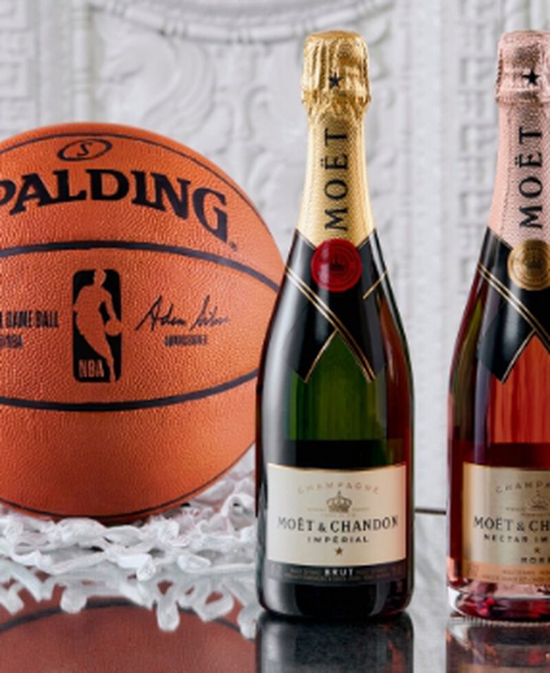 Bottle of Moët & Chandon Imperial Brut with a basketball