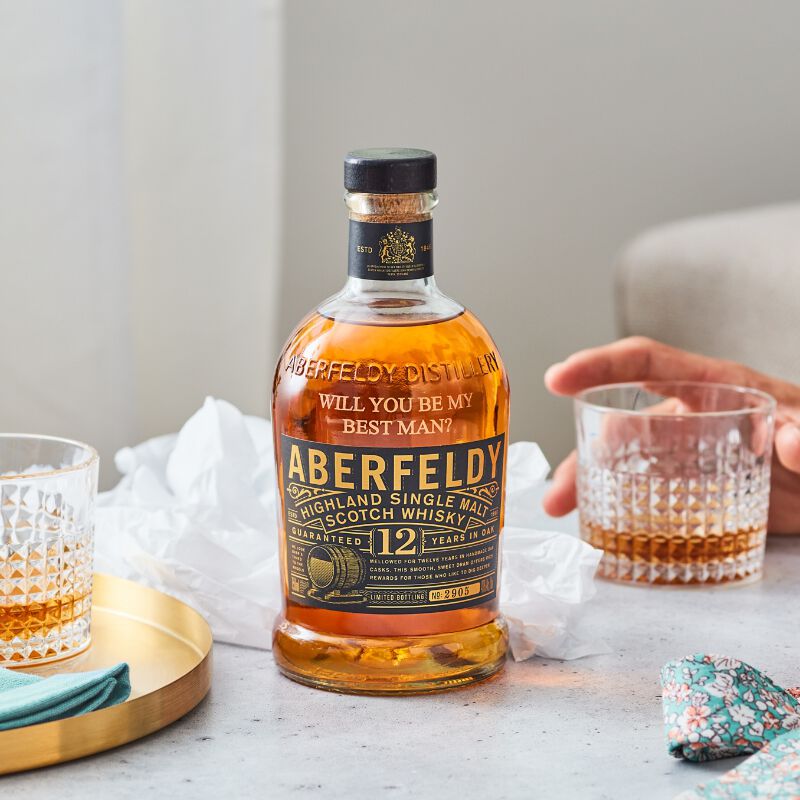 A bottle of Aberfeldy engraved with "Will you be my Best Man?"
