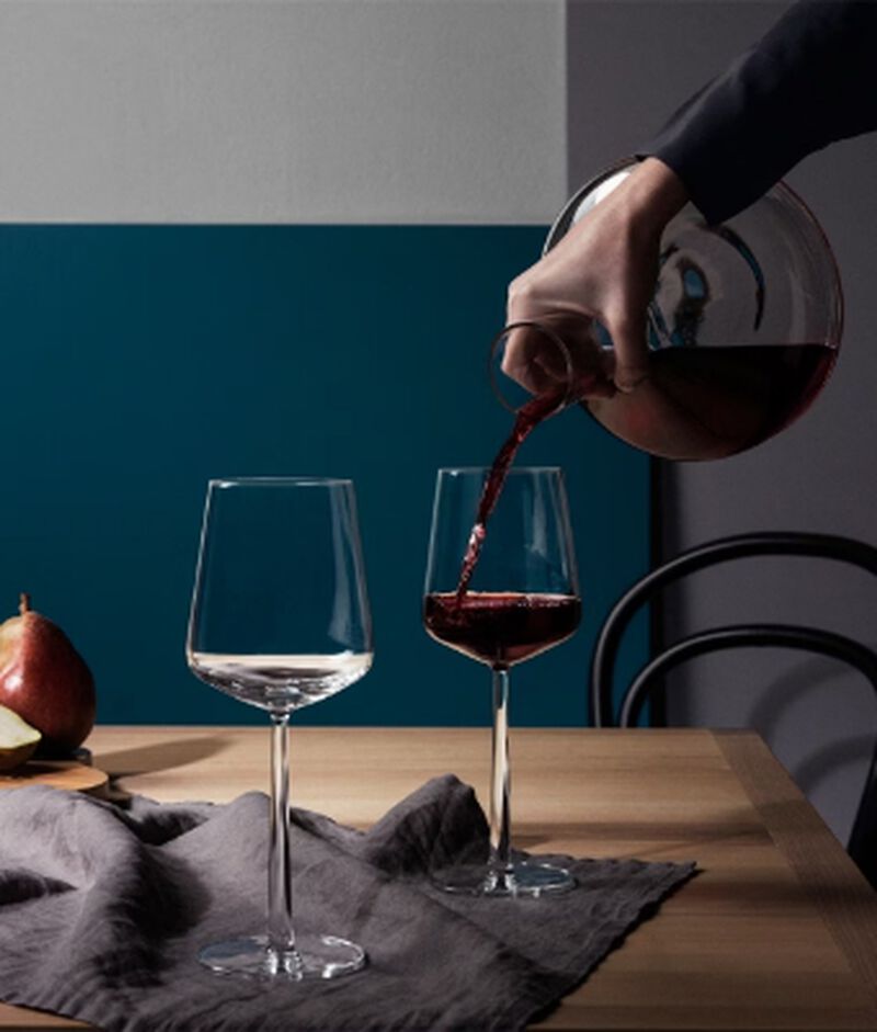 Red wine being poured from a iittala 2 Qt. Decanter 