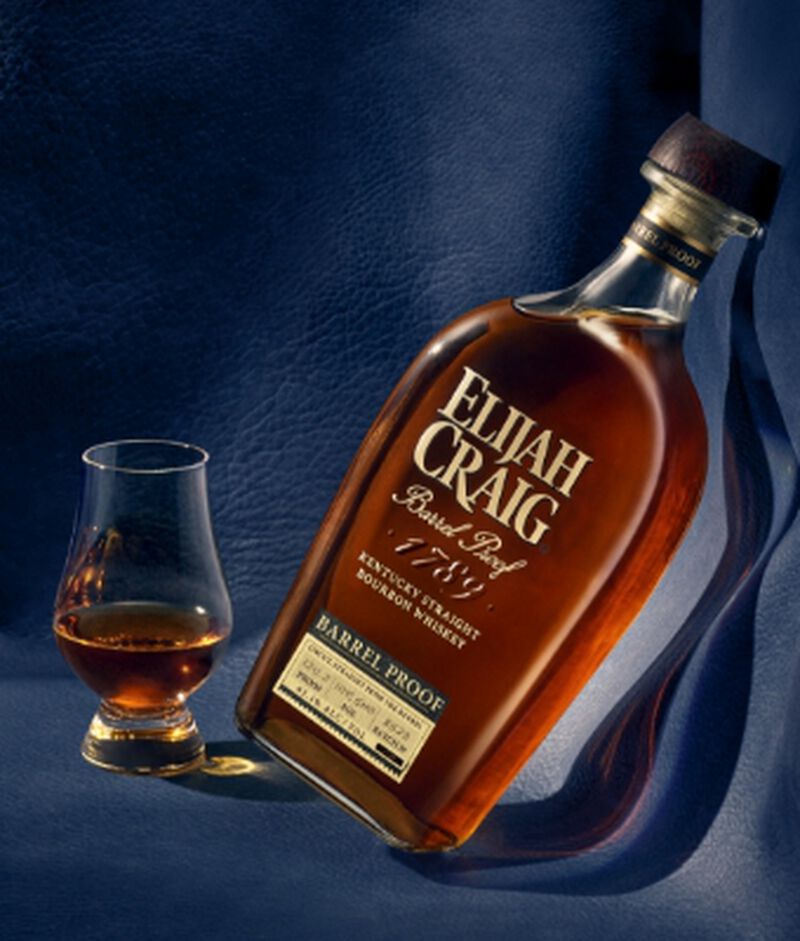 Bottle of Elijah Craig Barrel Proof Bourbon Whiskey with a glass