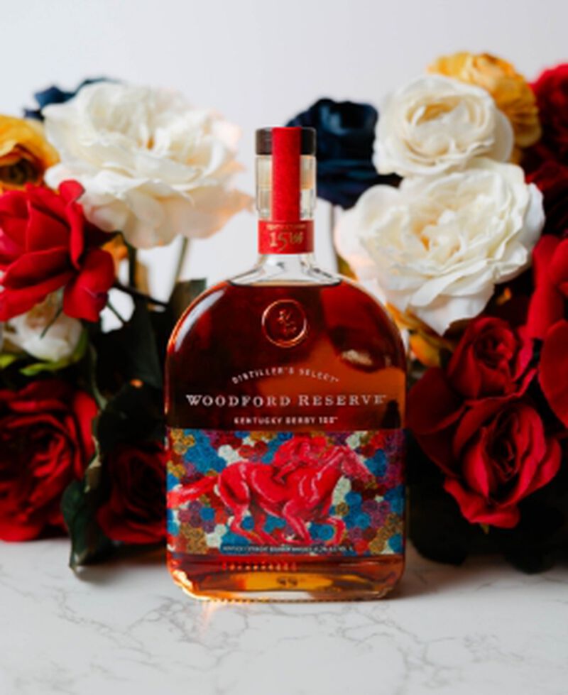 Bottle of Woodford Reserve® 2024 Kentucky Derby® 150 Bottle in front of roses