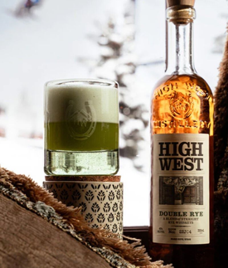 Bottle of High West Whiskey with a cocktail