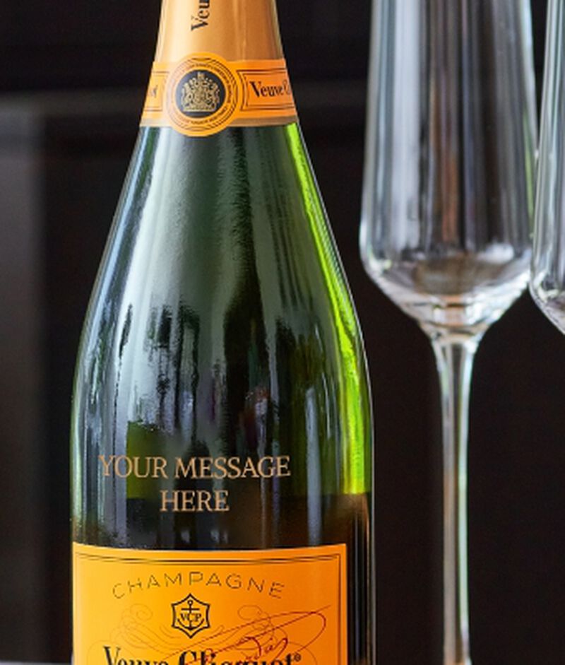 A bottle of Veuve with Custom Engraving