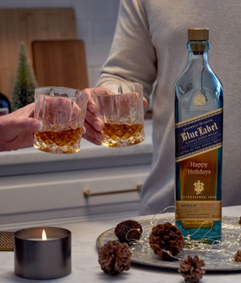 Bottle of Johnnie Walker Blue Label engraved with "Happy Holidays"